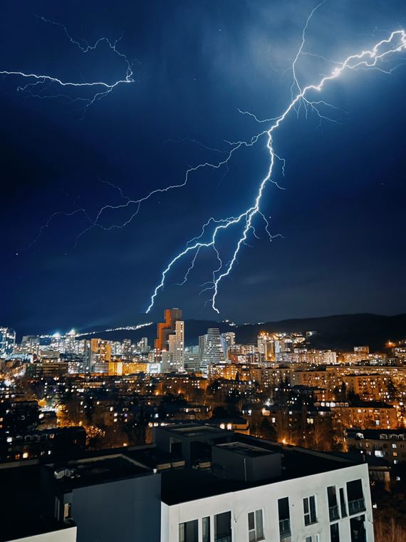 Lightning over the bay, Georgia - photograph by Lika Arobelidze