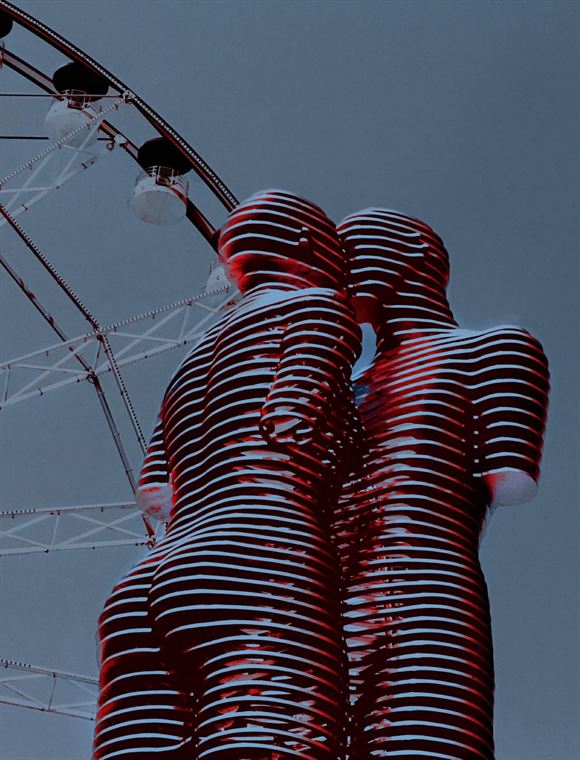 Ali and Nino, and the wheel, Batumi - photograph by Lika Arobelidze