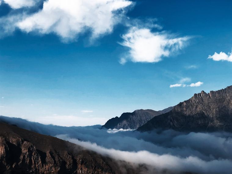 Blue over white, Greater Caucasus - photograph by Lika Arobelidze