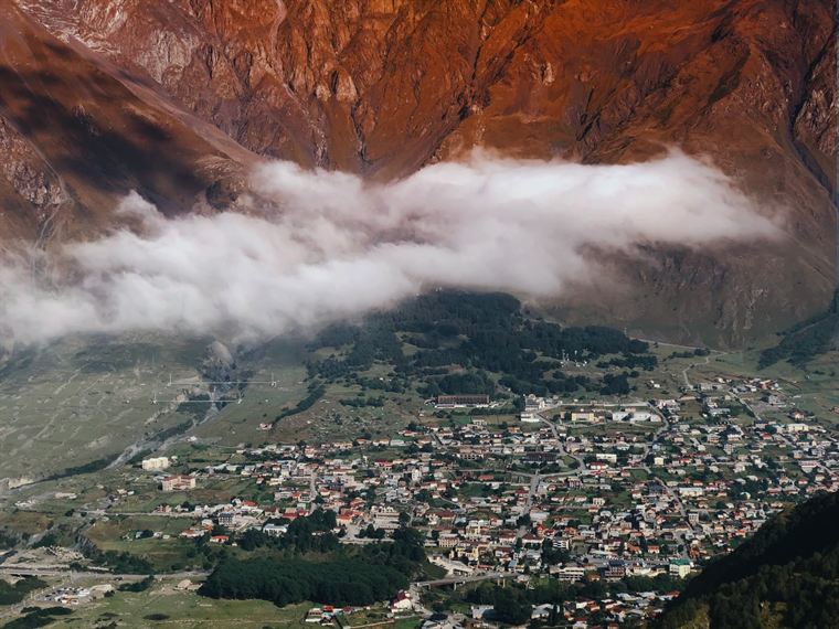 The town below, Stepantsminda - photograph by Lika Arobelidze