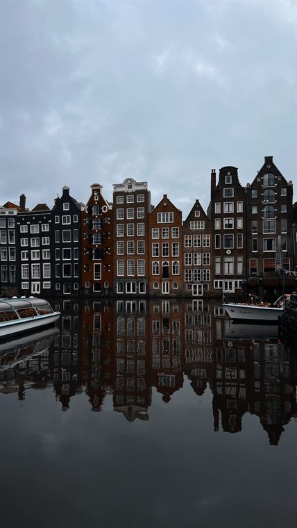 Reflected façades, Amsterdam - photograph by Lika Arobelidze