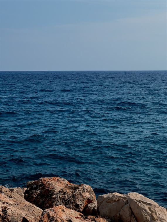 Rocks and open sea, Côte d'Azur - photograph by Lika Arobelidze