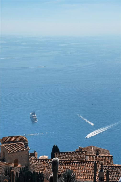 Roofs, then water, Côte d'Azur - photograph by Lika Arobelidze