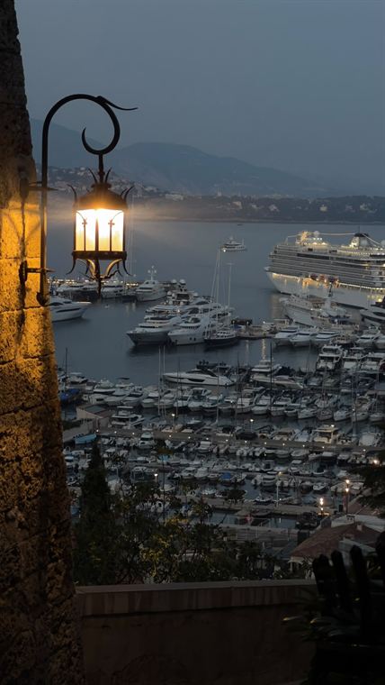 Lamp over the harbour, Côte d'Azur - photograph by Lika Arobelidze