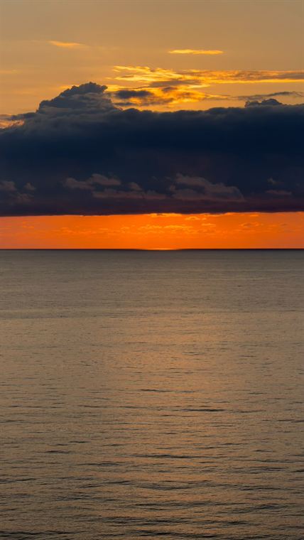 Evening, flat sea - photograph by Lika Arobelidze